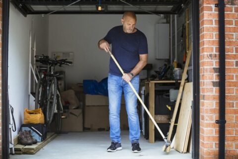 A person preparing garage for renovation in Chicago & Northwest Indiana