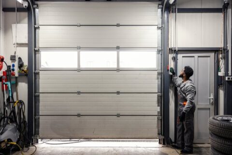 A better build garage professional repairing the garage door in Chicago, IL
